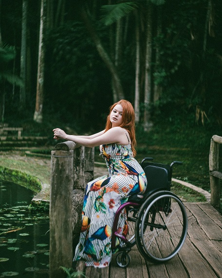 Fotógrafa na cadeira de rodas