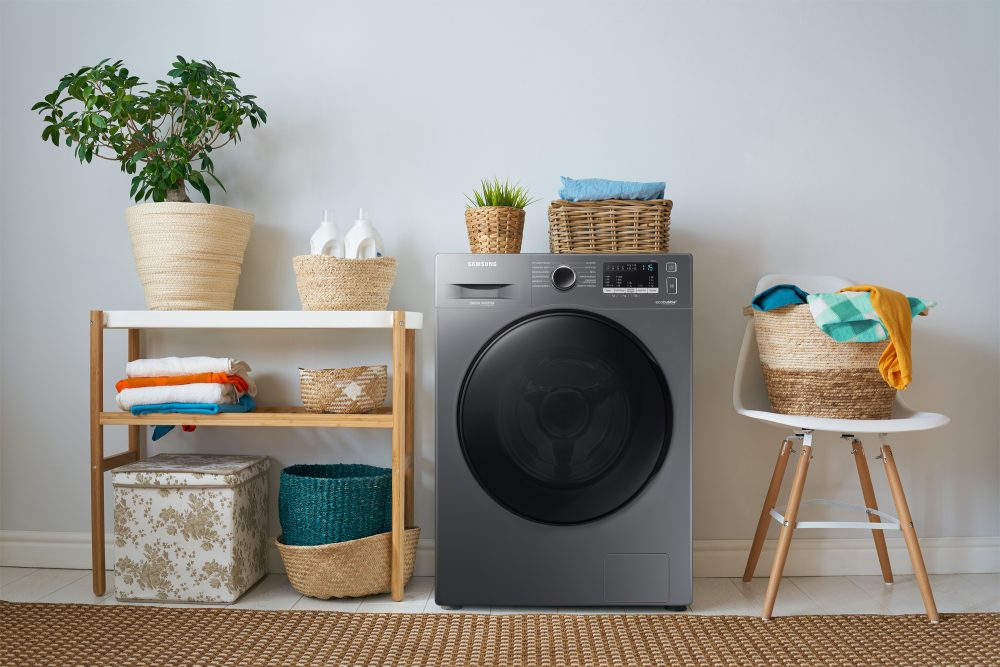 Imagem da máquina Lava e Seca WD11A Ecobbuble™ da Samsung em uma lavanderia